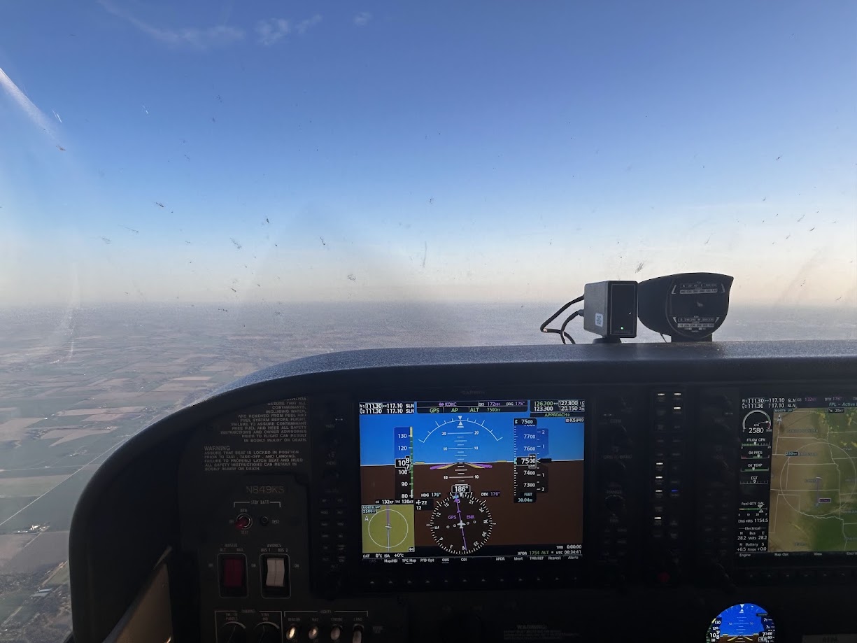 Pilot refreshing skills during a flight review with a flight instructor