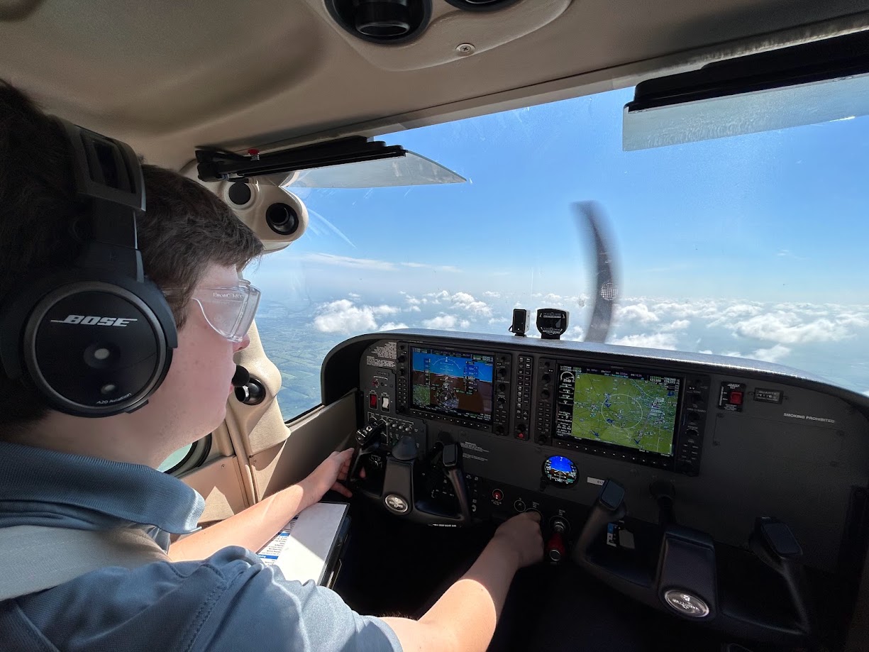 Pilot completing an instrument proficiency check in a training aircraft